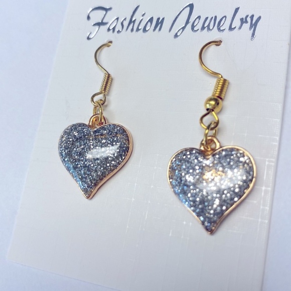 Glitter heart earrings.  Smooth have a blue tone in certain light.